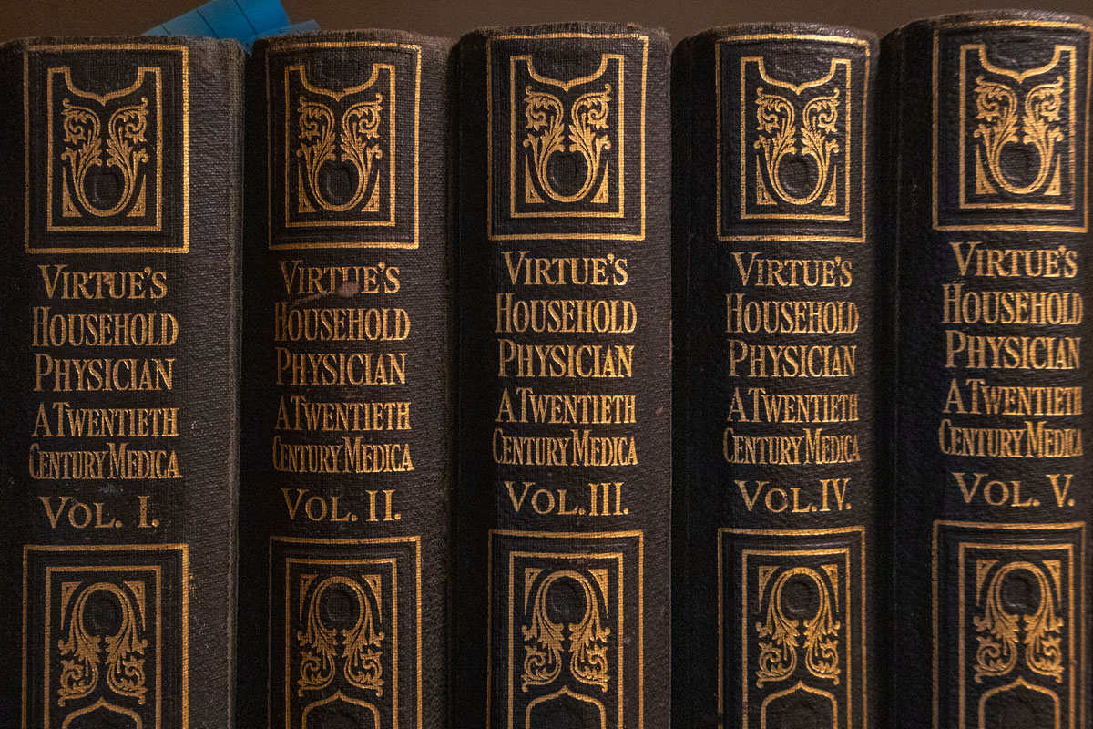 Spine of books from the Virtue's Household Physician collection